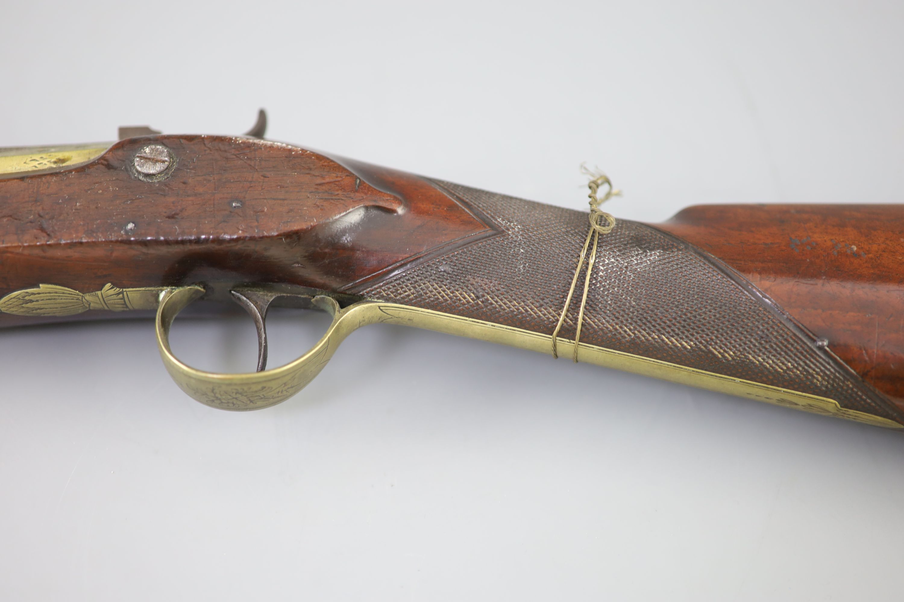 A late 18th century brass barrelled flintlock blunderbuss, by Jones, length 30in.